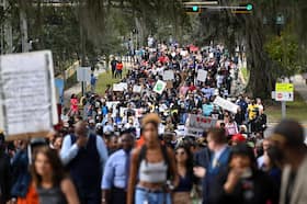 Demonstrators in Tallahassee protest Florida Gov. Ron DeSantis's plan to eliminate Advanced Placement courses on African American studies in February 2023. (Joshua Lott/The Washington Post)