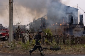 Ukrainian firefighters respond to an artillery strike Sunday in Pokrovsk, Ukraine.