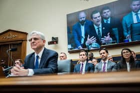 Rep. Matt Gaetz looms on screen as Attorney General Merrick Garland testifies before the House in June. (Jabin Botsford/The Washington Post)