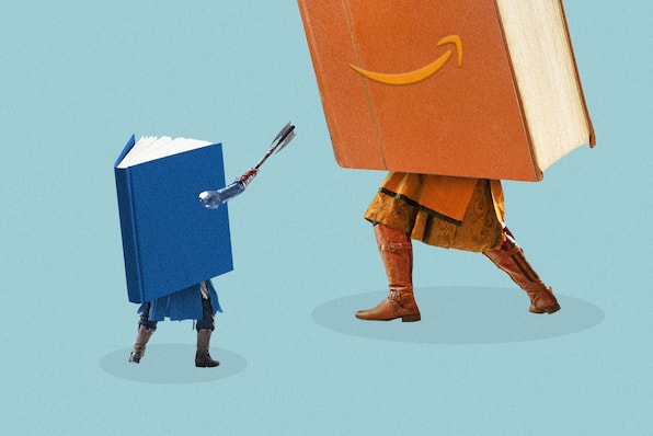 A small book hurls a weapon at a large book whose cover is embossed with the Amazon logo