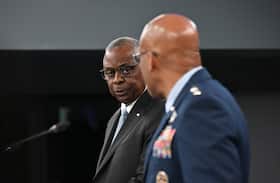 Defense Secretary Lloyd Austin, left, and Gen. Charles Q. Brown Jr., chairman of the Joint Chiefs of Staff, hold a news conference May 20 at the Pentagon.