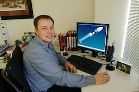 Elon Musk is seen at his desk on March 19, 2004, in El Segundo, California.