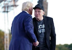 Tech billionaire Elon Musk shares an aside with Donald Trump during a campaign event last month in Pennsylvania.